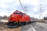 M&E GP15-1 # 24 powers the train across Ridgedale Avenue Xing in East Hanover on its way back to Whippany